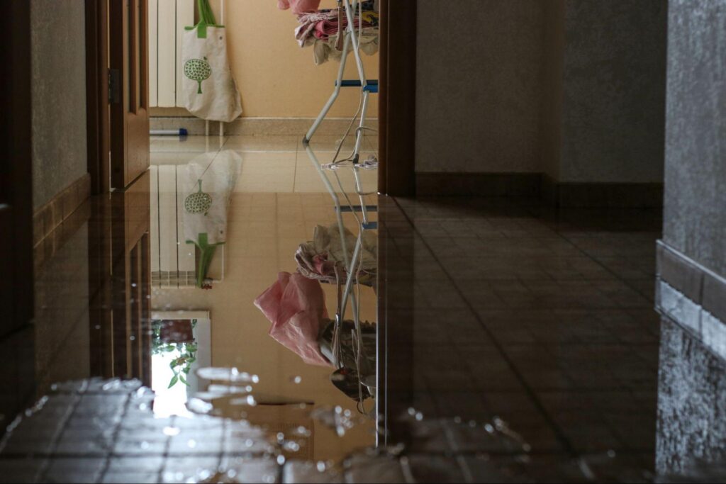 Water damage due a broken pipe. Moisture problem and wet floor. 
